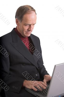 Business Man browsing on laptop