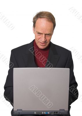 Business Man browsing on laptop