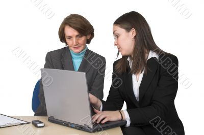 business female partners with laptop