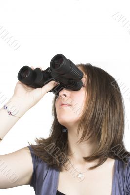 beatiful girl with binoculars searching