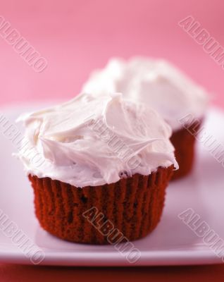red velvet cupcakes with vanilla frosting