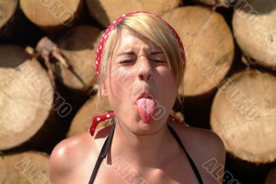 women shows her tongue