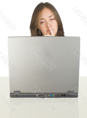 business woman on her desk with a laptop