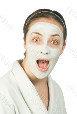 Suprised woman with face mask