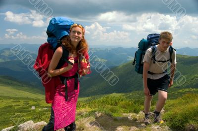 Couple of a backpacking tourists