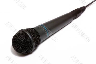Grey microphone isolated on white.