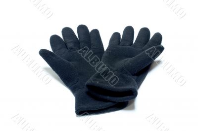 Woolen gloves against white background