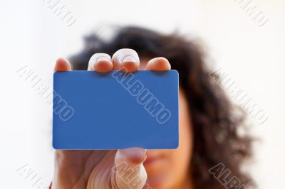 Woman with a credit card on her hand