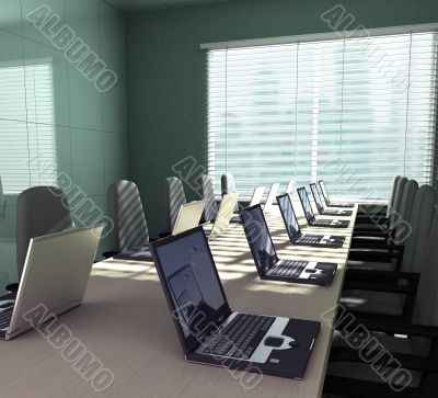Laptops in an empty room