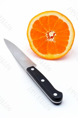Knife and Half an orange