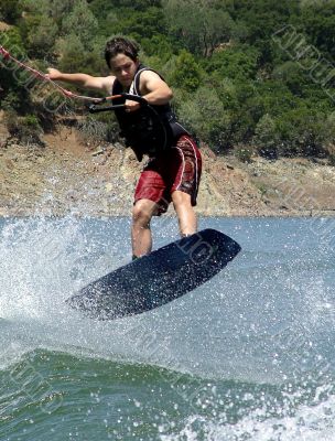 boy wakeboarding