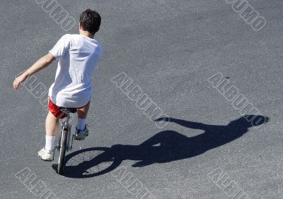 Boy on a unicycle
