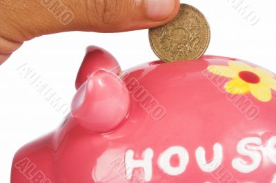 british pound in piggy bank