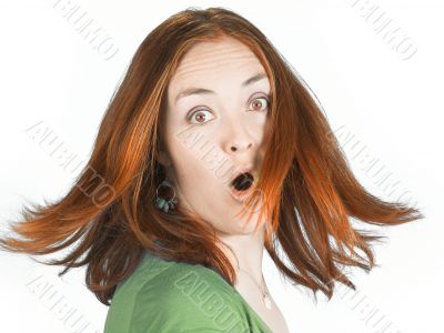 Suprised woman with coloured hair in movement