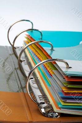 Binder closeup with files stacked