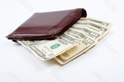Old leather wallet with bills inside