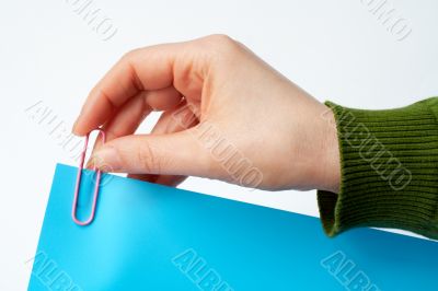 place a clip on blue document on white background place a clip on blue document on white background
