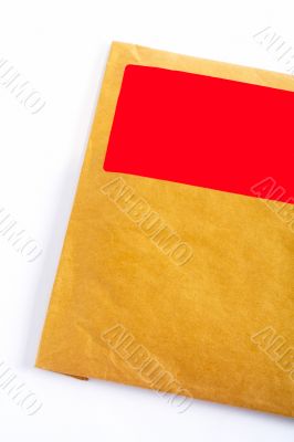 Detail of envelope with blank red sticker Detail of envelope with blank red sticker