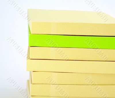 Yellow and green Blank Post-it papers stack