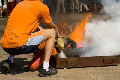 The fireman extinguishes foam fire