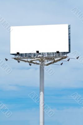 Blank billboard on cloudy sky