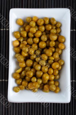 Peas on bamboo mat