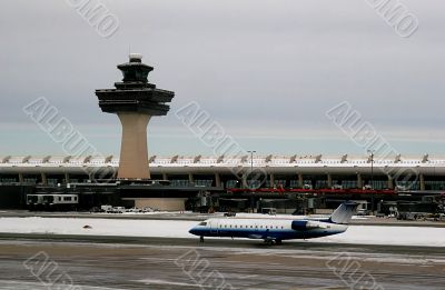 Plane on Snowy Tarmac