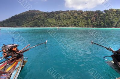 longtails boats on turquoise longtails boats on turquoise