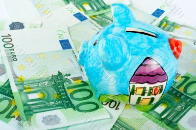 Piggy bank on euro money