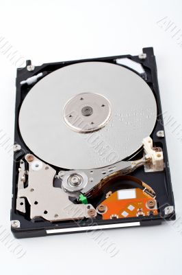 Opened hard disk drive, with water drops