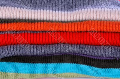 Several colors pullovers stack