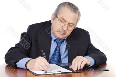 seniors man writing