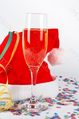 Champagne glass and christmas hat