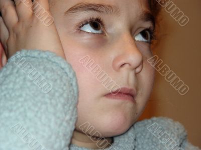 Cute girl thinking hard