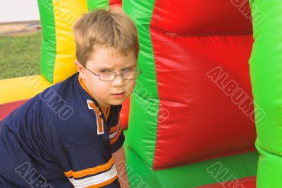 Boy Playing On Obstacle Course