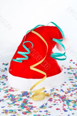 Christmas hat with ribbons and confetti