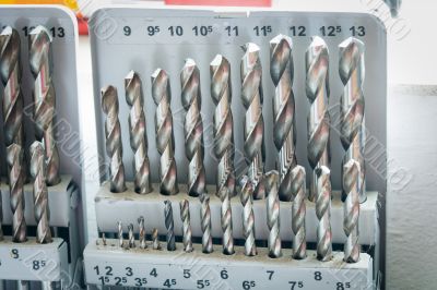 a collection of spiral drills