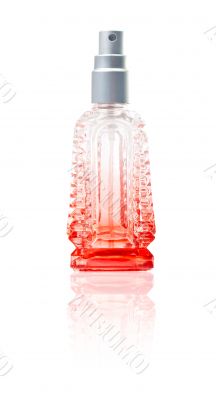 Bottle of parfum with reflection