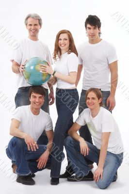 five young people with a globe
