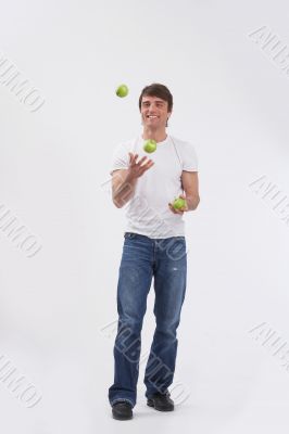 juggling three apples