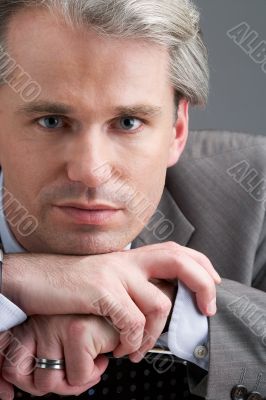 portrait of a businessman with his hands