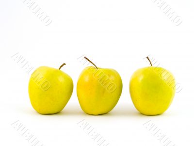 Three yellow apples