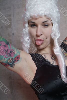 woman with tattoo and peruke