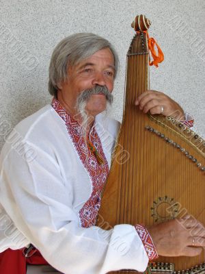 Senior ukrainian folk Kobzar with bandura