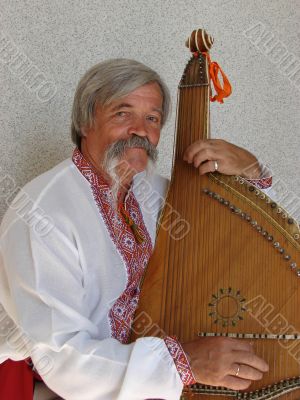 Senior ukrainian folk Kobzar with bandura