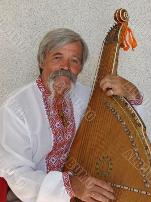 Senior ukrainian folk Kobzar with bandura