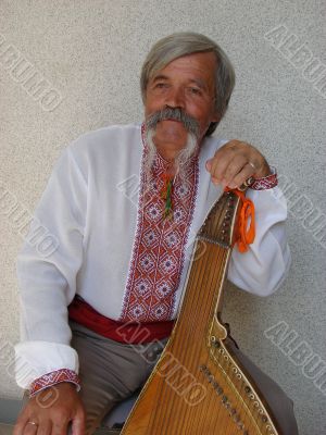 Senior ukrainian folk Kobzar with bandura