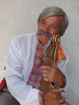 Senior ukrainian folk Kobzar with bandura