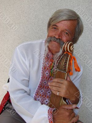 Senior ukrainian folk Kobzar with bandura