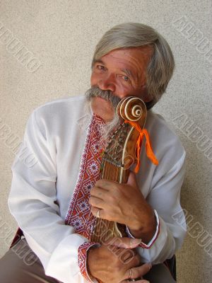 Senior ukrainian folk Kobzar with bandura